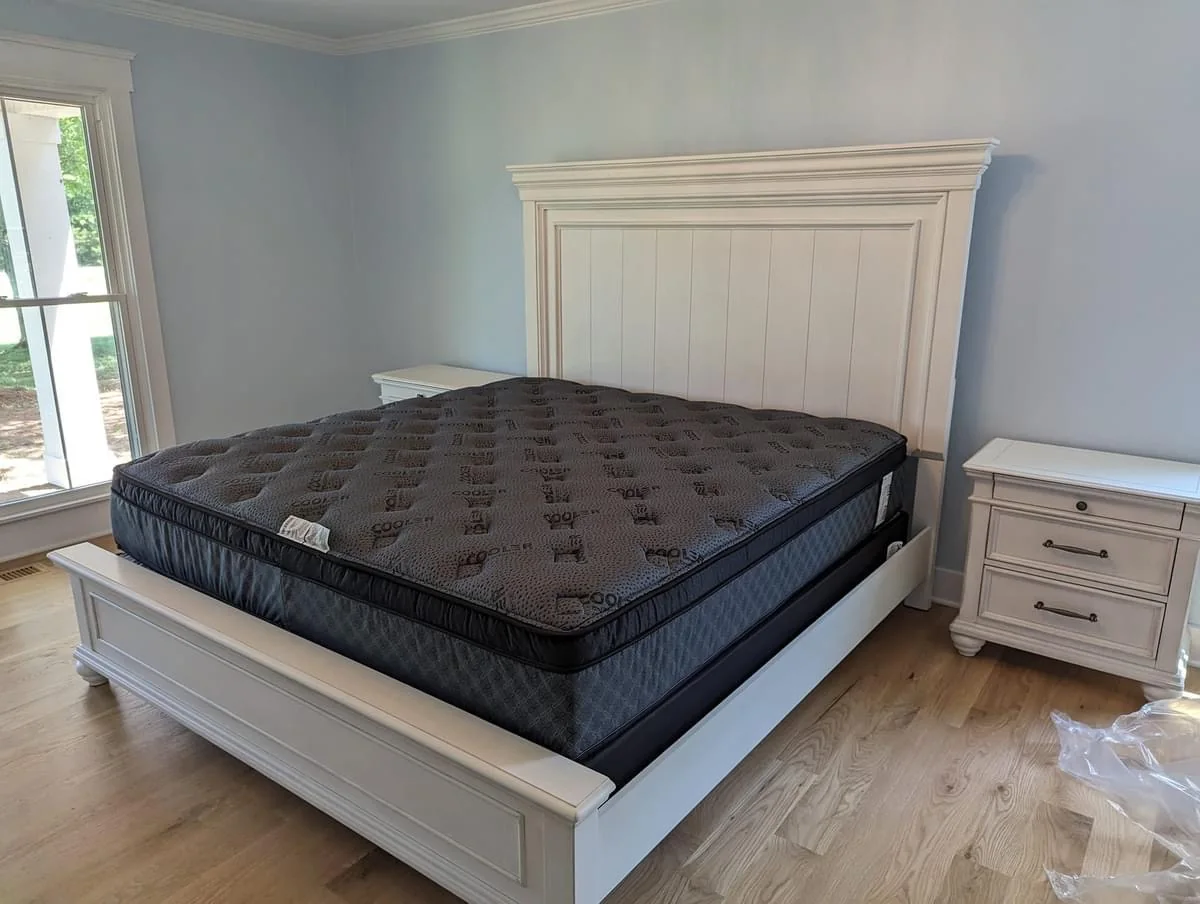 Premium dark mattress in bedroom setting